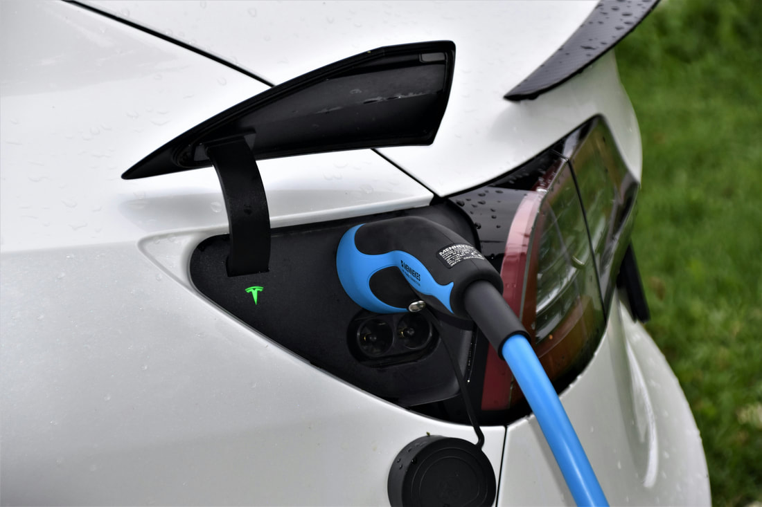 Driving Forward: Exploring the Electric Vehicle Revolution in the Automotive Industry