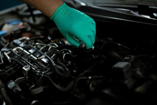 Overfilling Engine Oil: Risks, Symptoms, and Solutions for Your Car